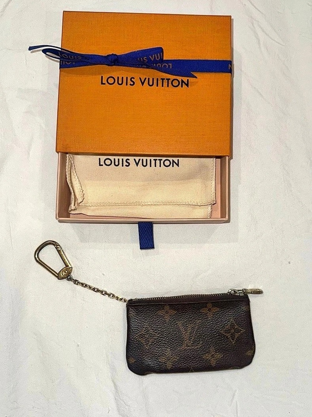 Louis Vuitton Pochette Cles Monogram Coin Purse Brown- comes with box and dust b